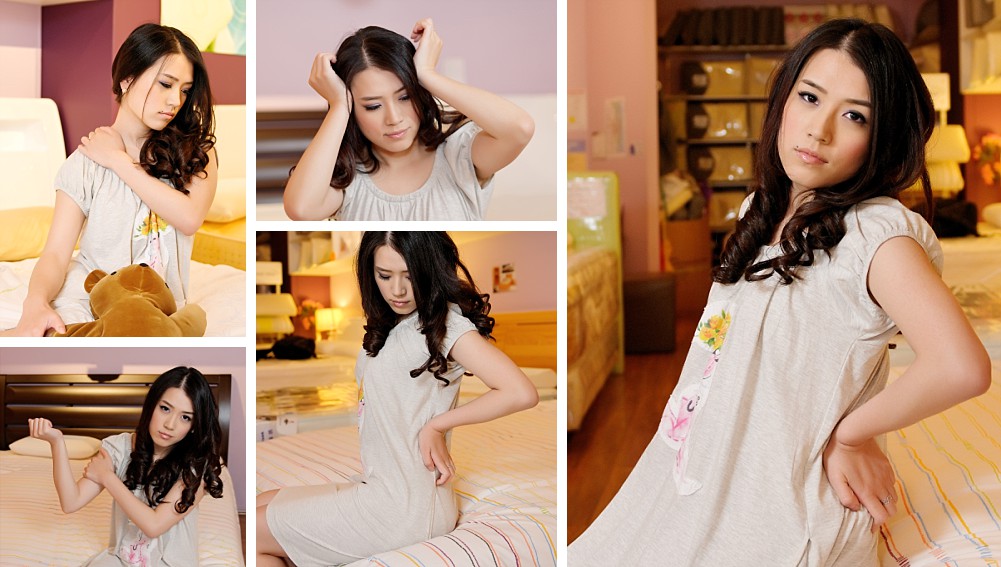 Young woman in sleepwear in bed for Sleepmart Advertising shoot